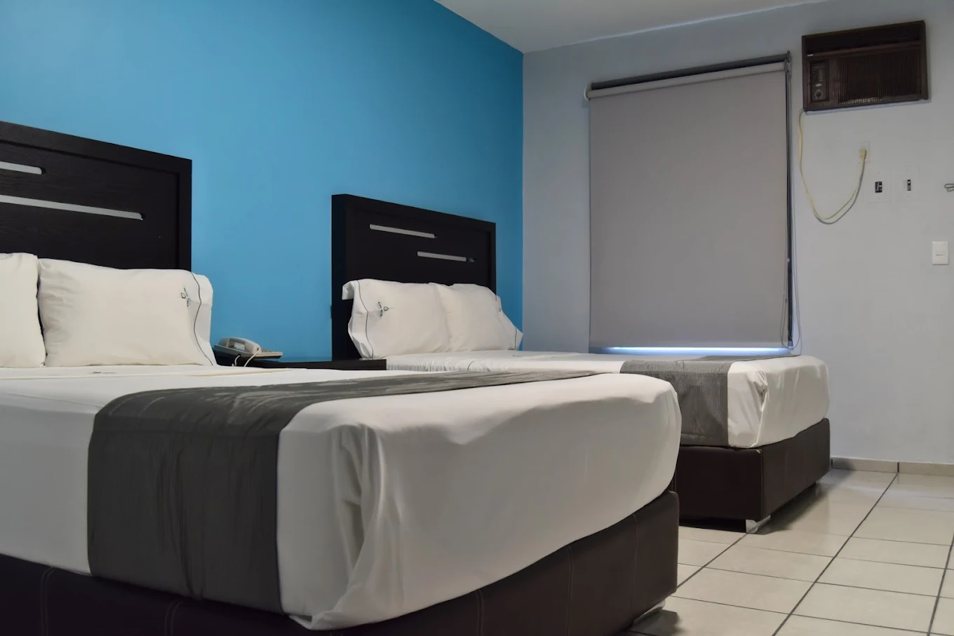 Habitación doble cómoda para grupos cerca de la Expo